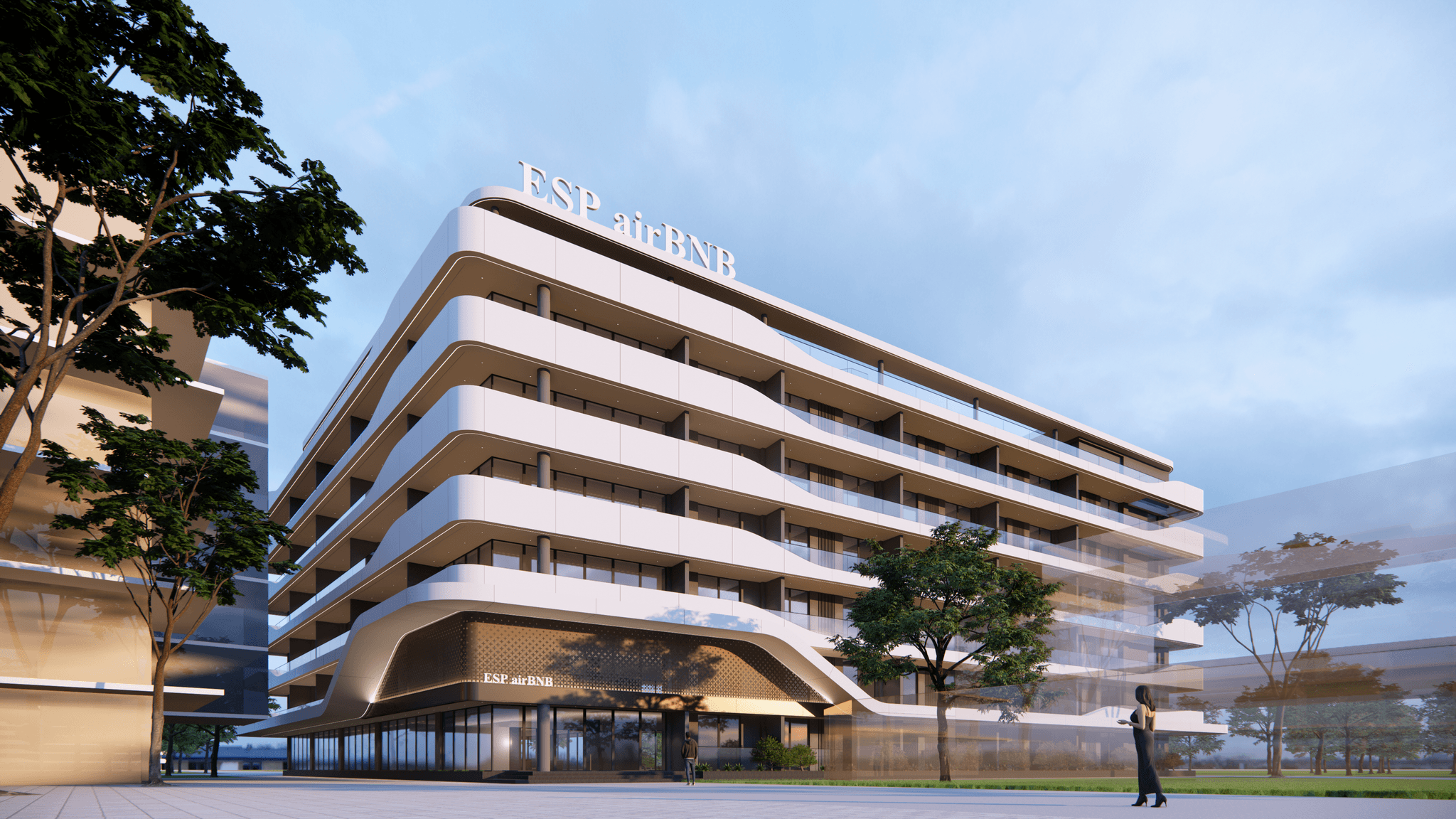 ESP Apartments building exterior at dusk with illuminated curved balconies and entrance