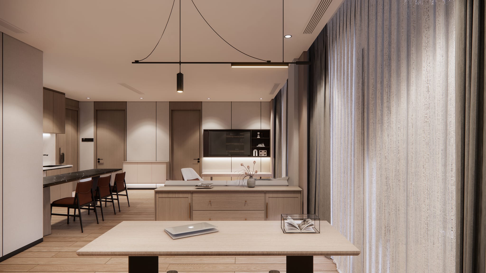 Standard residence kitchen breakfast bar opening to living area with sheer curtains