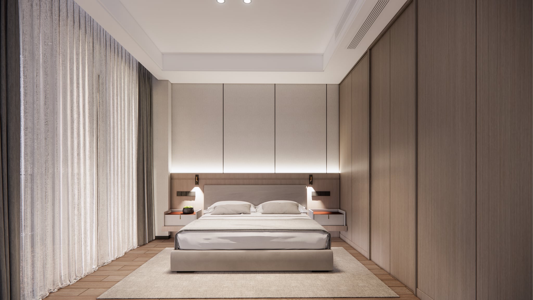 Studio residence bedroom with upholstered headboard panels and soft ambient lighting